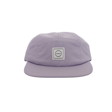 A lilac colored nylon five-panel kid's hat with an adjustable velcro back and fabric eyelets on the side panels.